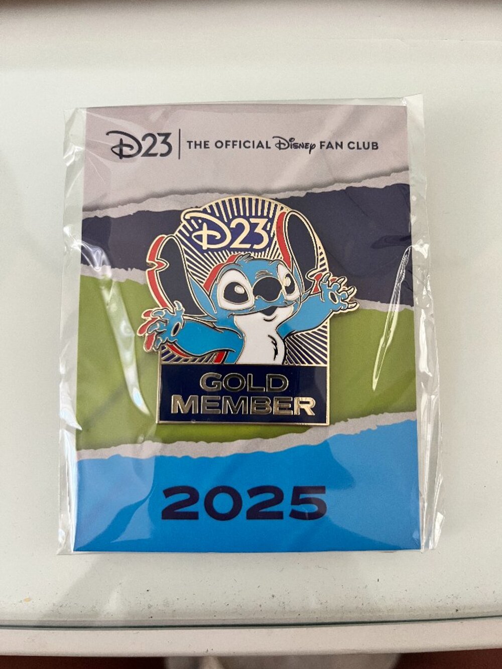 D23 2025 Gold Member Pin featuring Stitch